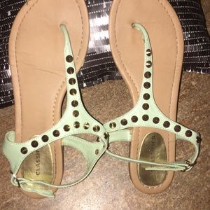 teal blue studded sandals. Back strap